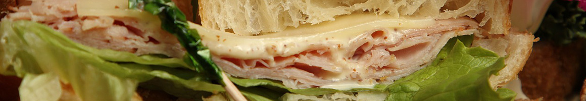 Eating Sandwich at Cattle Dog Coffee Roasters restaurant in Hernando, FL.